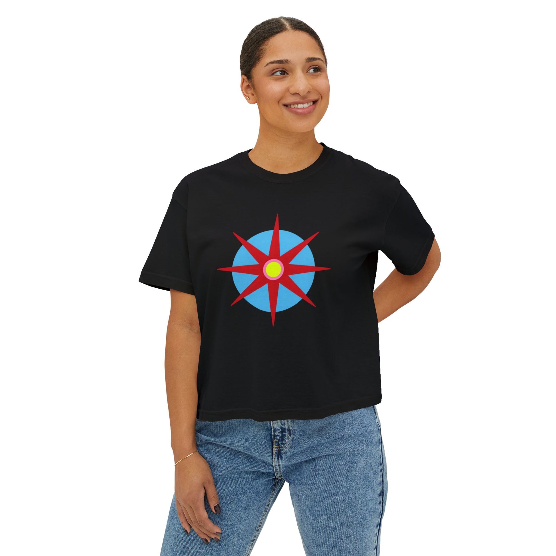 Melammu 8-point star boxy tee in black — red 8-point star on a light blue circle with yellow centre on the front, white Melammu logo on back