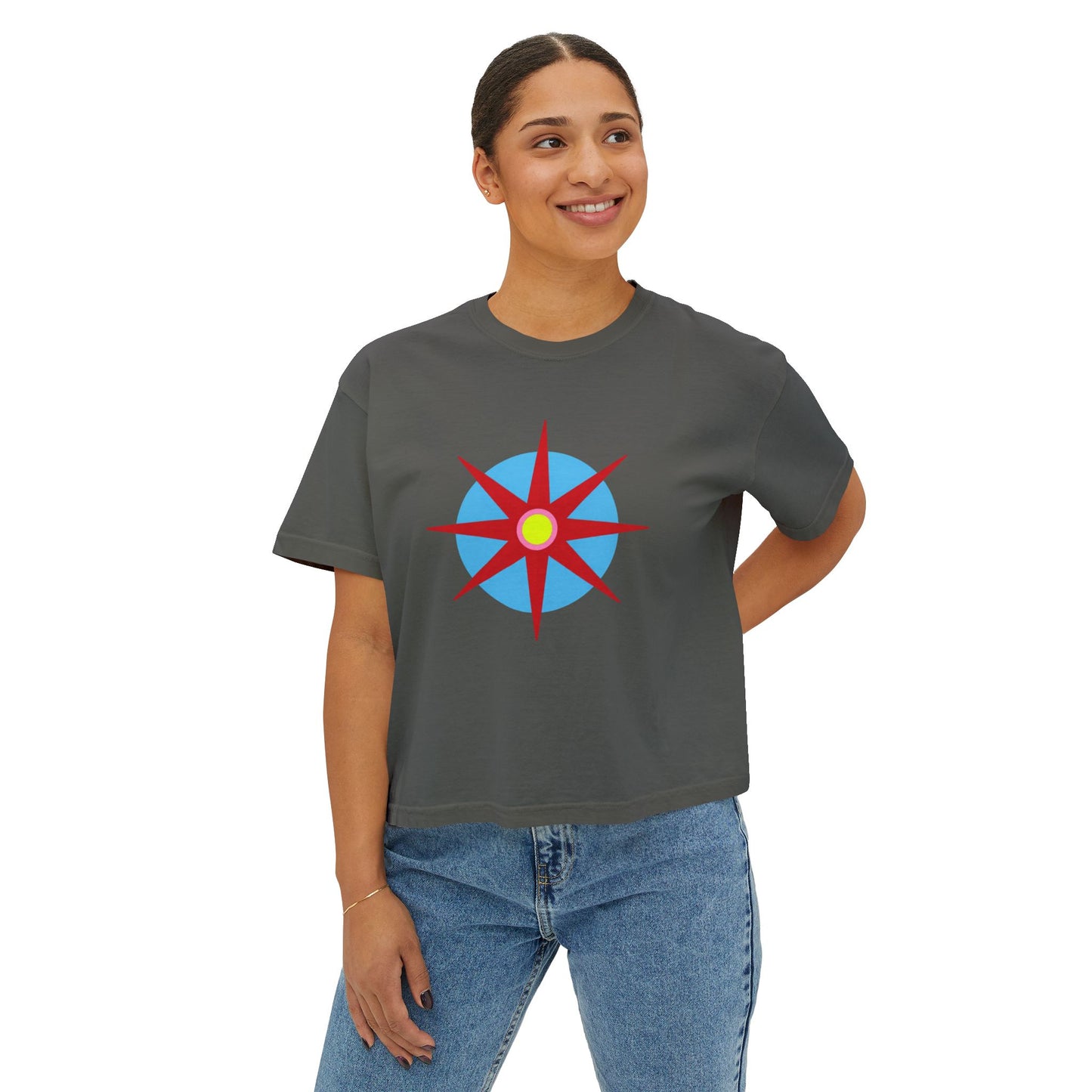 Melammu 8-point star boxy tee in dark grey — red 8-point star on a light blue circle with yellow centre, white Melammu logo on back