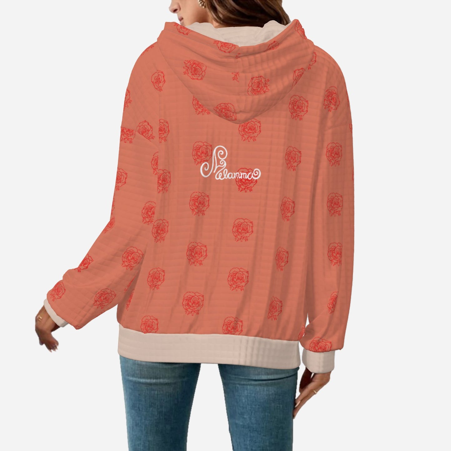 delicate knit fabric chic luxury cosy hoodie designer salmon pink exclusive Melammu rose line drawing in red, flowing across the fabric in a half-drop repeat wearable art Dusky pink trim