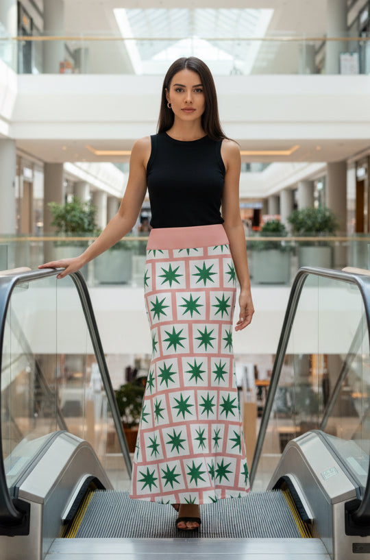 Bold Designer Valentina Theodora skirt pink maxi flared skirt with 8 point green star on white square tiles in brick formation statement piece high fashion dare to wear bold colour geometric shapes