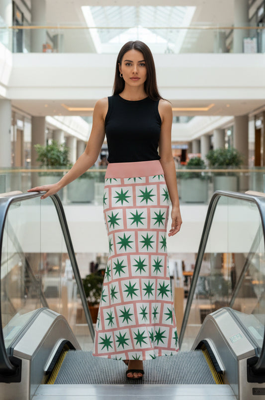 Bold Designer Valentina Theodora skirt pink maxi flared skirt with 8 point green star on white square tiles in brick formation statement piece high fashion dare to wear bold colour geometric shapes