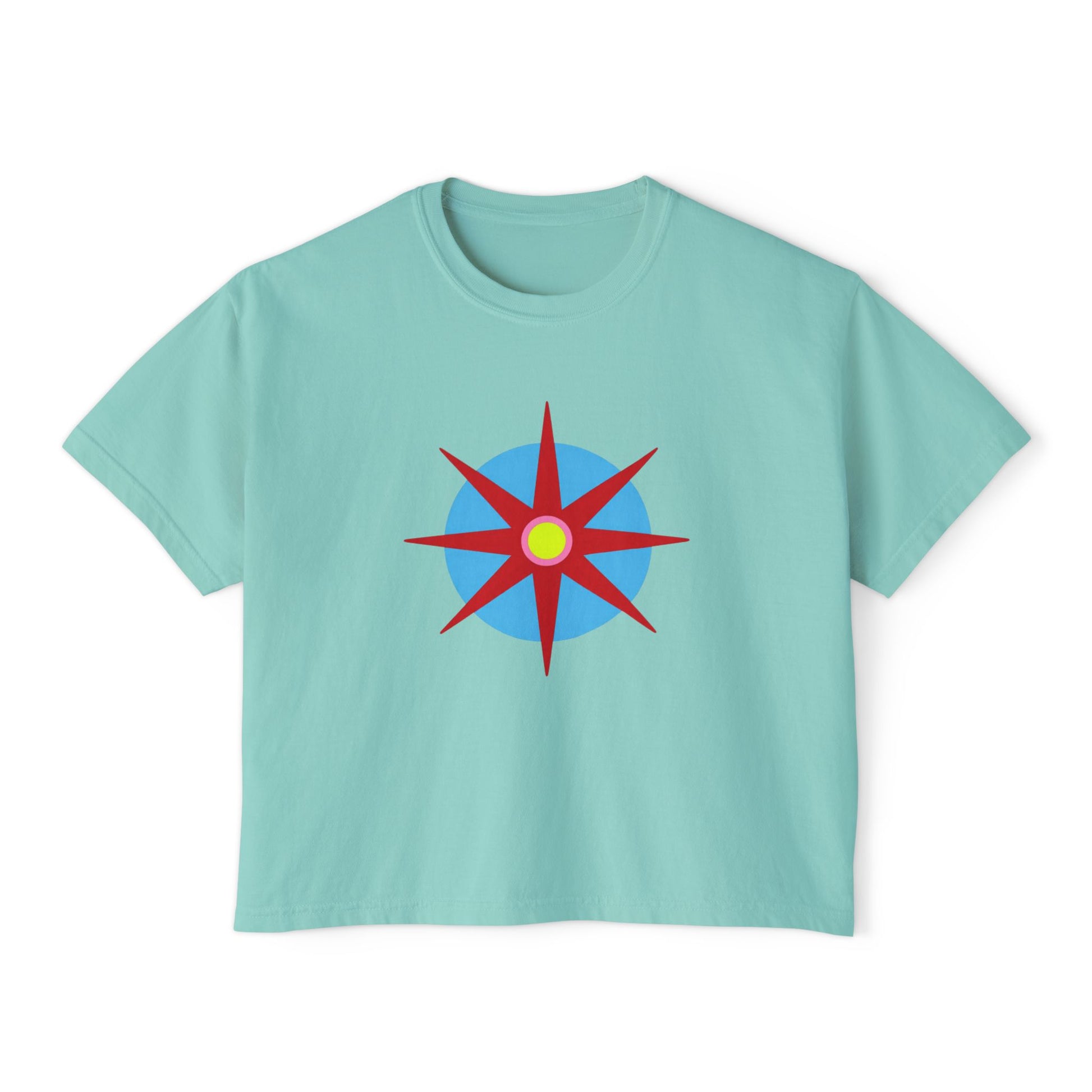 Melammu 8-point star boxy tee in chalky mint — red 8-point star on a light blue circle with yellow centre on the front, white Melammu logo on back