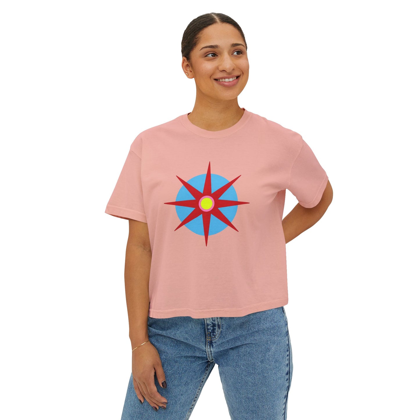 Melammu 8-point star boxy tee in pink— red 8-point star on a light blue circle with yellow centre, white Melammu logo on back