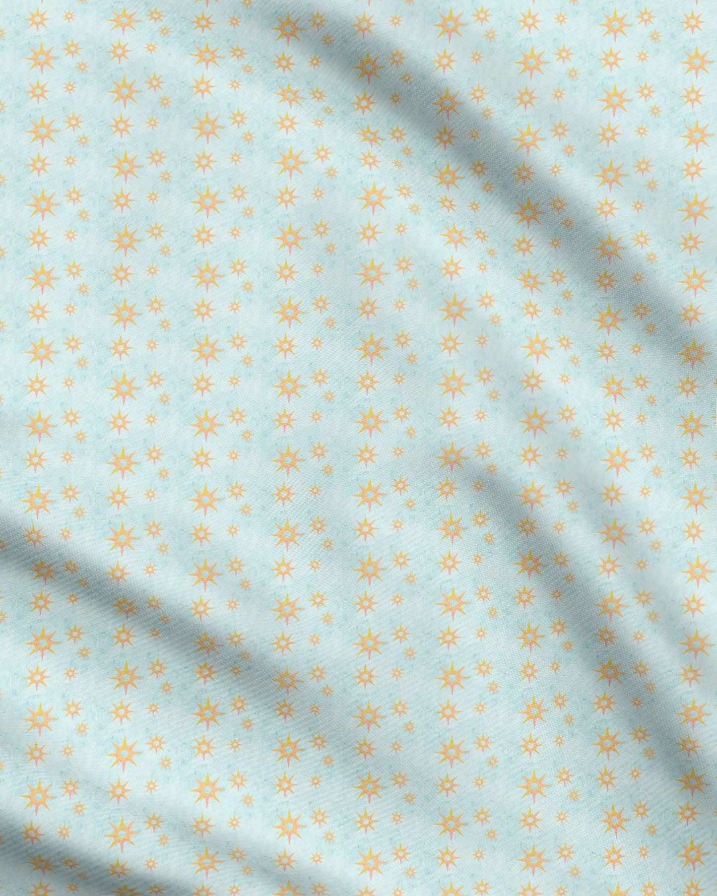 Melammu 8 point gold and pink 3d star on light blue fabric