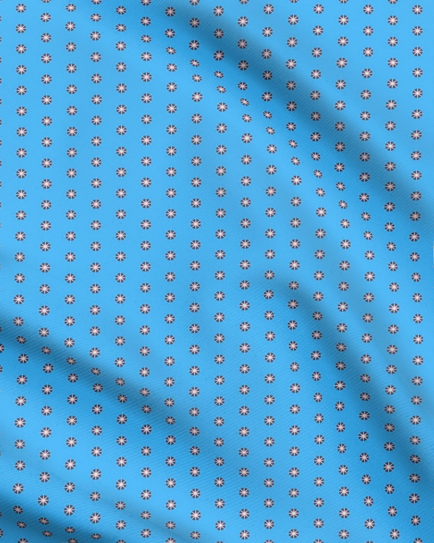 Melammu 8 point star on light blue fabric (larger)