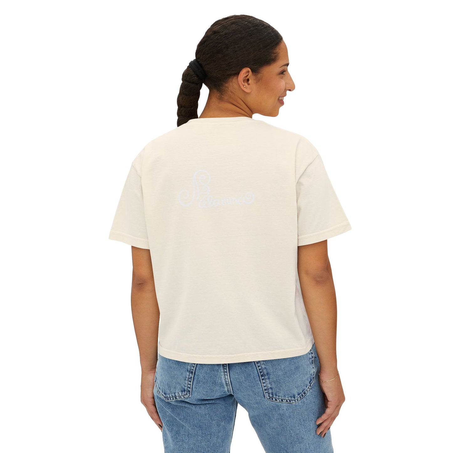 Melammu 8-point star boxy tee in Ivory — red 8-point star on a light blue circle with yellow centre, navy Melammu logo on back