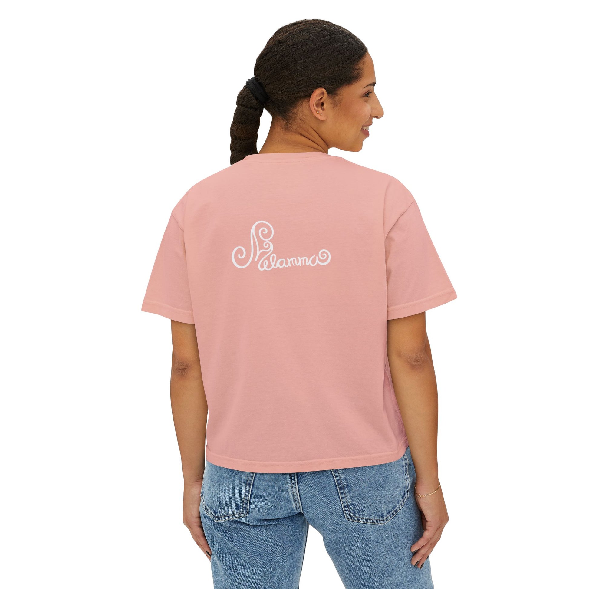 Melammu 8-point star boxy tee in pink— red 8-point star on a light blue circle with yellow centre, white Melammu logo on back