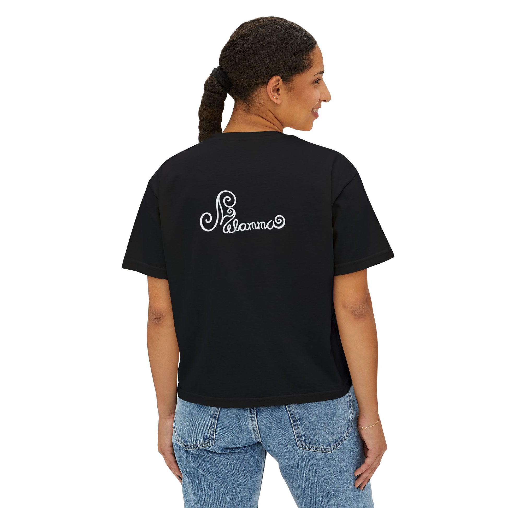 Melammu 8-point star boxy tee in black — red 8-point star on a light blue circle with yellow centre on the front, white Melammu logo on back