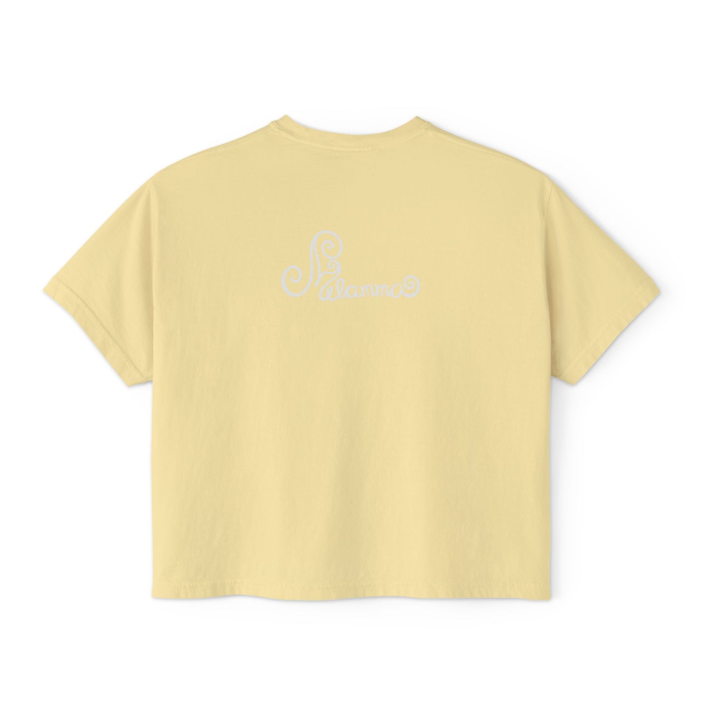 Melammu 8-point star boxy tee in Butter — red 8-point star on a light blue circle with yellow centre, white Melammu logo on back